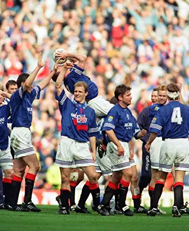 Glasgow Rangers footballer Paul Gascoigne kisses the match ball as he celebrates Rangers Glasgow Rangers footballer Paul Gascoigne kisses the match ball as he celebrates Rangers