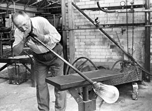 Images Dated 1st July 1987: Glass blower Bill Tremble is tube drawing a glass bulb in July 1987
