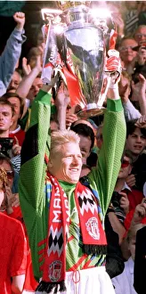 Goalkeeper Peter Schmeichel holds the Carling Premierhip Trophy won by Manchester United Goalkeeper Peter Schmeichel holds the Carling Premierhip Trophy won by Manchester United
