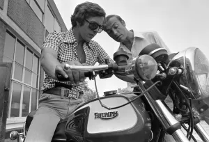 Grand Prix motorcycle road racer Phil Read sits on an Norton Villiers Triumph Bonneville Grand Prix motorcycle road racer Phil Read sits on an Norton Villiers Triumph Bonneville