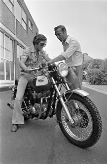 Grand Prix motorcycle road racer Phil Read sits on an Norton Villiers Triumph Bonneville Grand Prix motorcycle road racer Phil Read sits on an Norton Villiers Triumph Bonneville