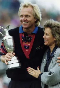 Greg Norman with his wife Laura holding the British Golf Open trophy Greg Norman with his wife Laura holding the British Golf Open trophy