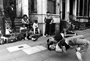 A group of breakdancers, the Eastwood Rockers, going through their break dancing paces A group of breakdancers, the Eastwood Rockers, going through their break dancing paces