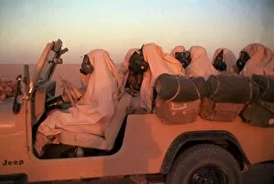 Images Dated 11th October 1990: Gulf War Operation Desert Storm. Egyptian SAS Soldiers wearing gas masks sitting fully