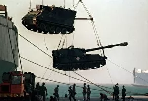 Images Dated 11th October 1990: Gulf War Operation Desert Storm. Tanks and mobile guns are unloaded from transport ships