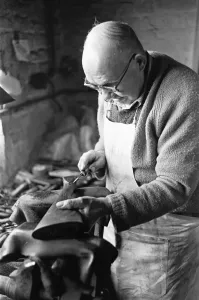 Gunsmith making a stock for a shotgun in Birmingham's Gun Quarter. Circa 1973 Gunsmith making a stock for a shotgun in Birmingham's Gun Quarter. Circa 1973