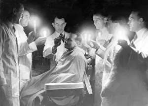 Haircutting under difficult circumstances in the Newcastle store of Bainbridge & Co Haircutting under difficult circumstances in the Newcastle store of Bainbridge & Co