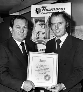 Hank Sharpe, Travel Agent with Brian Staff, North East General Manager Thomson Holidays Hank Sharpe, Travel Agent with Brian Staff, North East General Manager Thomson Holidays