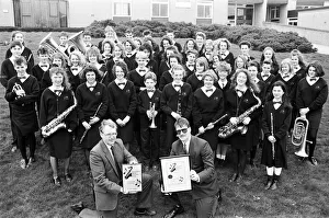 In harmony... Rastrick High School Concert Band, seen with head of music Mr Peter Lynch In harmony... Rastrick High School Concert Band, seen with head of music Mr Peter Lynch