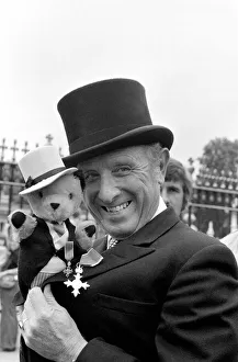 Harry Corbett and Sooty at investiture at Buckingham Palace. Jult 1976 Harry Corbett and Sooty at investiture at Buckingham Palace. Jult 1976