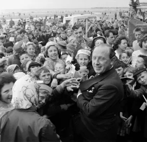 Harry Corbett and Sooty mobbed by fans at the Daily Mirror Beach party. August 1958 Harry Corbett and Sooty mobbed by fans at the Daily Mirror Beach party. August 1958