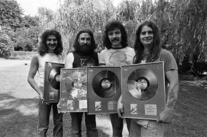 Heavy Metal group Black Sabbath pictured with the silver discs they received for Heavy Metal group Black Sabbath pictured with the silver discs they received for