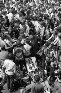 Hells Angels help pass a collapsed fan forward to the fist aid attendants at free Rolling Hells Angels help pass a collapsed fan forward to the fist aid attendants at free Rolling