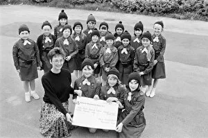 Images Dated 6th June 1988: Helping others... these members of 82nd Huddersfield (St Barnabas Church) Brownies