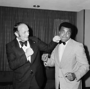 Henry Cooper fooling around with fellow boxer Muhammad Ali at a press conference in Henry Cooper fooling around with fellow boxer Muhammad Ali at a press conference in