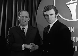 Henry Cooper and Joe Bugner shake hands at the Sportsman Club after signing to fight Henry Cooper and Joe Bugner shake hands at the Sportsman Club after signing to fight
