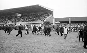 Hereford United fans celebrate by running on the pitch after second goal Hereford Hereford United fans celebrate by running on the pitch after second goal Hereford