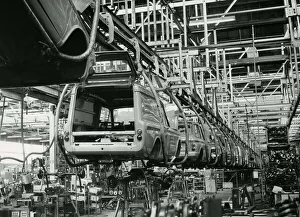 Hillman Imp cars and vans on production line hanging from cradles at Rootes car factory Hillman Imp cars and vans on production line hanging from cradles at Rootes car factory