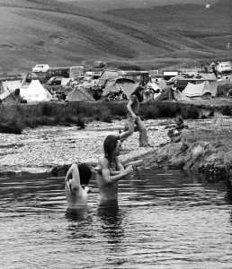 Hippies having a wash in some water. 7th July 1976 Hippies having a wash in some water. 7th July 1976