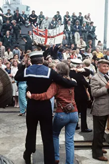 HMS Arrow Falklands War a sailor walks along arm in arm with his wife after arriving back HMS Arrow Falklands War a sailor walks along arm in arm with his wife after arriving back