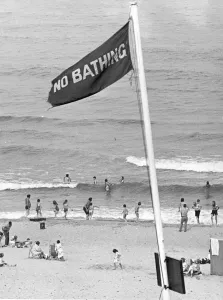 Holidaymakers risk their lives by ignoring the NO BATHING signs at this North East beach Holidaymakers risk their lives by ignoring the NO BATHING signs at this North East beach