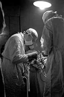 Hospital Operation. On girl's tumour on the brain. January 1947 O6263-001 Hospital Operation. On girl's tumour on the brain. January 1947 O6263-001