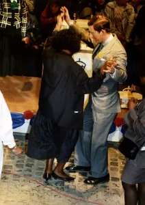 HRH Prince Charles dances with a member of the crowd during 40th birthday celebrations HRH Prince Charles dances with a member of the crowd during 40th birthday celebrations