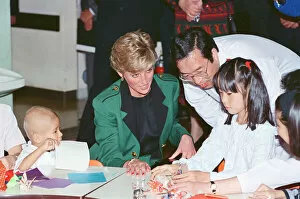 Images Dated 14th November 1990: HRH Princess Diana, The Princess of Wales with workers at the Honda factory in Tokyo