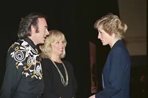 Images Dated 15th November 1989: HRH The Princess of Wales, Princess Diana, greets American singer Neil Diamond