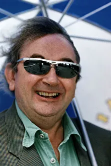 Ian McCaskill wearing a pair of Topman Sunglasses holding umbrella C/photo Ian McCaskill wearing a pair of Topman Sunglasses holding umbrella C/photo