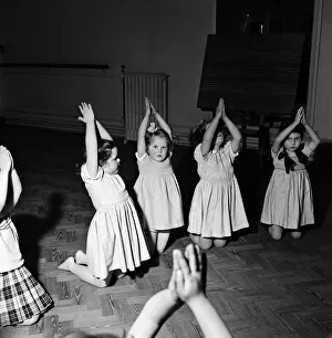 Infant schoolchildren playing during a dance and movement class. Feburary 1953 D715-005 Infant schoolchildren playing during a dance and movement class. Feburary 1953 D715-005