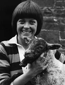 Isla St Clair actress with a lamb on location for the new series of The Farm Isla St Clair actress with a lamb on location for the new series of The Farm