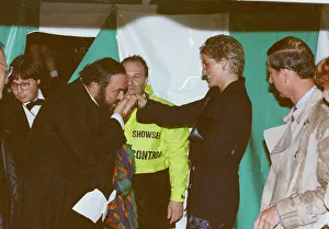 Italian opera singer Luciano Pavarotti kisses the hand of Princess Diana as Prince Italian opera singer Luciano Pavarotti kisses the hand of Princess Diana as Prince