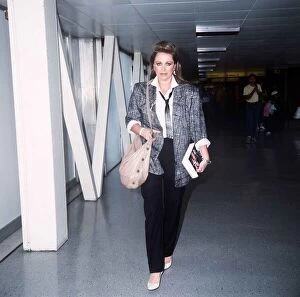 Images Dated 1st September 1985: Jackie Collins arriving at Heathrow with her new book September 1985