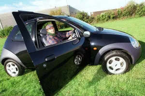 Jackie Stewart with his Ford Ka car January 1998 drivers door Jackie Stewart with his Ford Ka car January 1998 drivers door