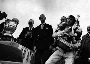 Jackie Stewart after winning British Grand Prix holding trophy July 1969 Jackie Stewart after winning British Grand Prix holding trophy July 1969