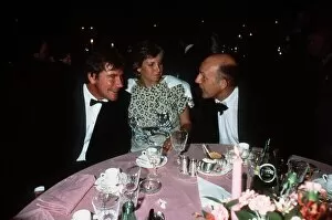Images Dated 23rd April 1987: James Hunt racing driver 1987 pictured with Sterling Moss at film premiere of Pontoon