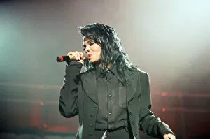Images Dated 21st October 1990: Janet Jackson performing on her Rhythm Nation World Tour at Wembley Arena