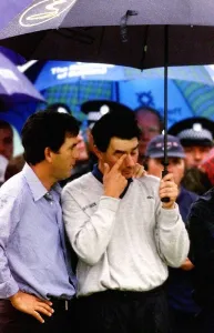 Jean Van De Velde is consoled as he waits at the winners presentation at Carnoustie Jean Van De Velde is consoled as he waits at the winners presentation at Carnoustie