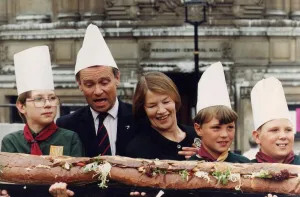 Jeffrey Archer and Glenda Jackson with some cub scouts wearing chef' Jeffrey Archer and Glenda Jackson with some cub scouts wearing chef'