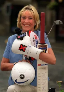 Jill Douglas TV Presenter 1999 who has joined Sky TV holding bat ball golf club Jill Douglas TV Presenter 1999 who has joined Sky TV holding bat ball golf club