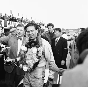 Jim Clark celebrates winning the Martini Rossi Trophy race at Snetterton 29th September Jim Clark celebrates winning the Martini Rossi Trophy race at Snetterton 29th September