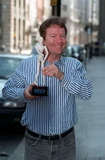 Jim Davidson Comedian/TV Presenter October 1997 Holding the new Generation Game show Jim Davidson Comedian/TV Presenter October 1997 Holding the new Generation Game show