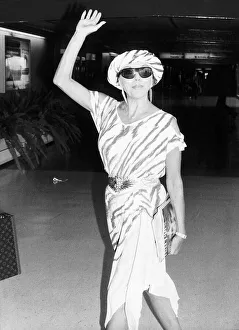 Joan Collins actress leaving London for Los Angeles to start a shoot of a new series of Joan Collins actress leaving London for Los Angeles to start a shoot of a new series of