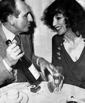 Images Dated 28th January 1981: Joan Collins during dinner with David Lewin at a Neal Street restaurant in London