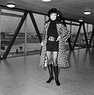 Joan Collins at Heathrow Airport today, she is going to Rome for a holiday Joan Collins at Heathrow Airport today, she is going to Rome for a holiday