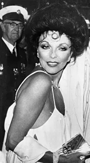 Joan Collins at premiere of The Stud wearing low cut evening gown - April 1978 Joan Collins at premiere of The Stud wearing low cut evening gown - April 1978