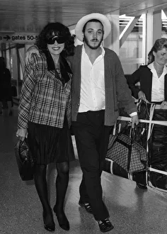 Joan Collins with her son Sacha aged 22 arriving from Los Angeles at Heathrow airport Joan Collins with her son Sacha aged 22 arriving from Los Angeles at Heathrow airport