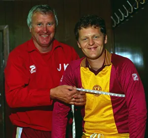 Jock Wallace with measuring tape around Andy Ritchie July 1983 Jock Wallace with measuring tape around Andy Ritchie July 1983
