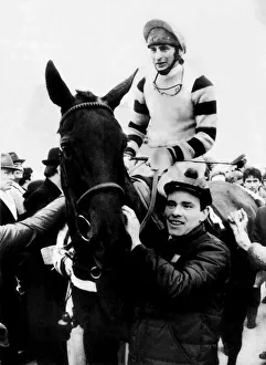 Jockey Phil Tuck on racehorse Burrough Hill Lad, being led into the winners enclosure Jockey Phil Tuck on racehorse Burrough Hill Lad, being led into the winners enclosure